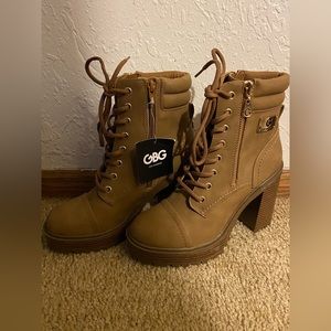 Brown heel boots. BRAND NEW!